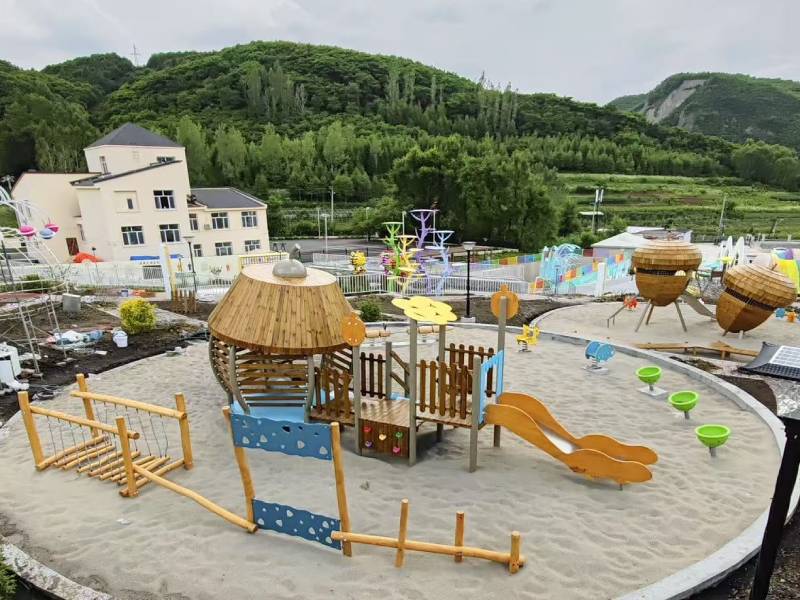 A visually striking hazelnut-themed outdoor playground elements caters specifically to early-age children, blending nature-inspired aesthetics with age-appropriate climbing, crawling, and imaginative play elements. Its cozy design encourages young children to explore safely while stimulating sensory and motor development.